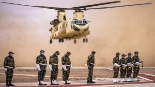 A Royal Moroccan Air Force CH-47 Chinook military helicopter takes off during the second annual "African Lion" military exercise in the Tan-Tan region in southwestern Morocco on June 30, 2022. (Photo by FADEL SENNA / AFP)